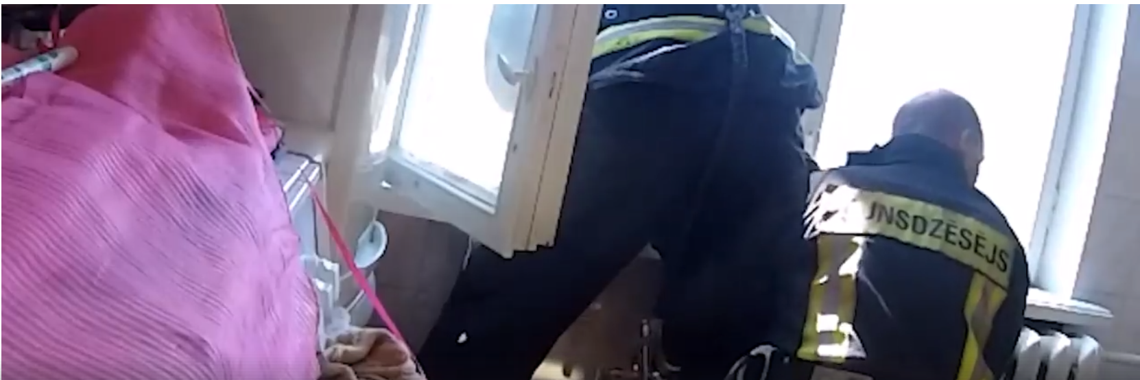 Latvia Firefighter Catches Falling Man from Window