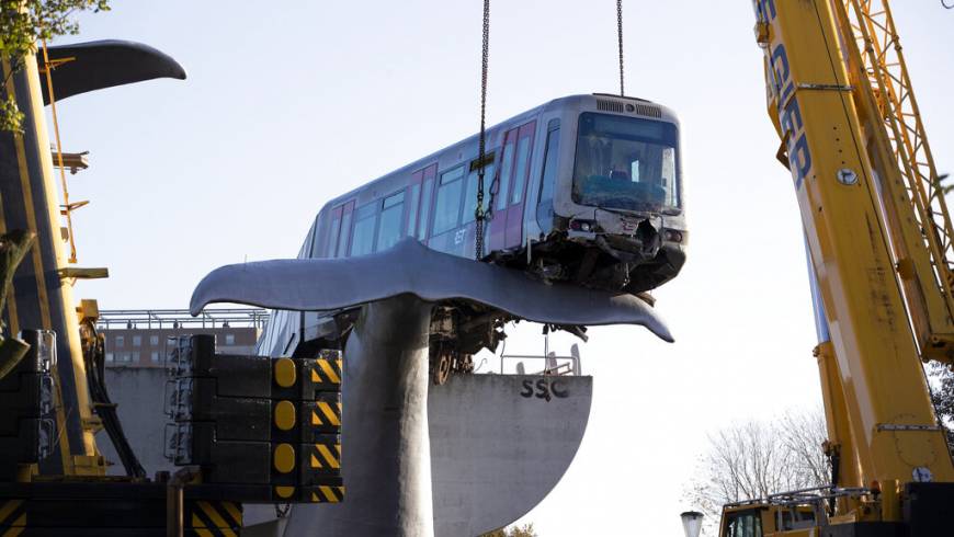 Cranes Lift Dutch Runaway Train Off Whale Sculpture